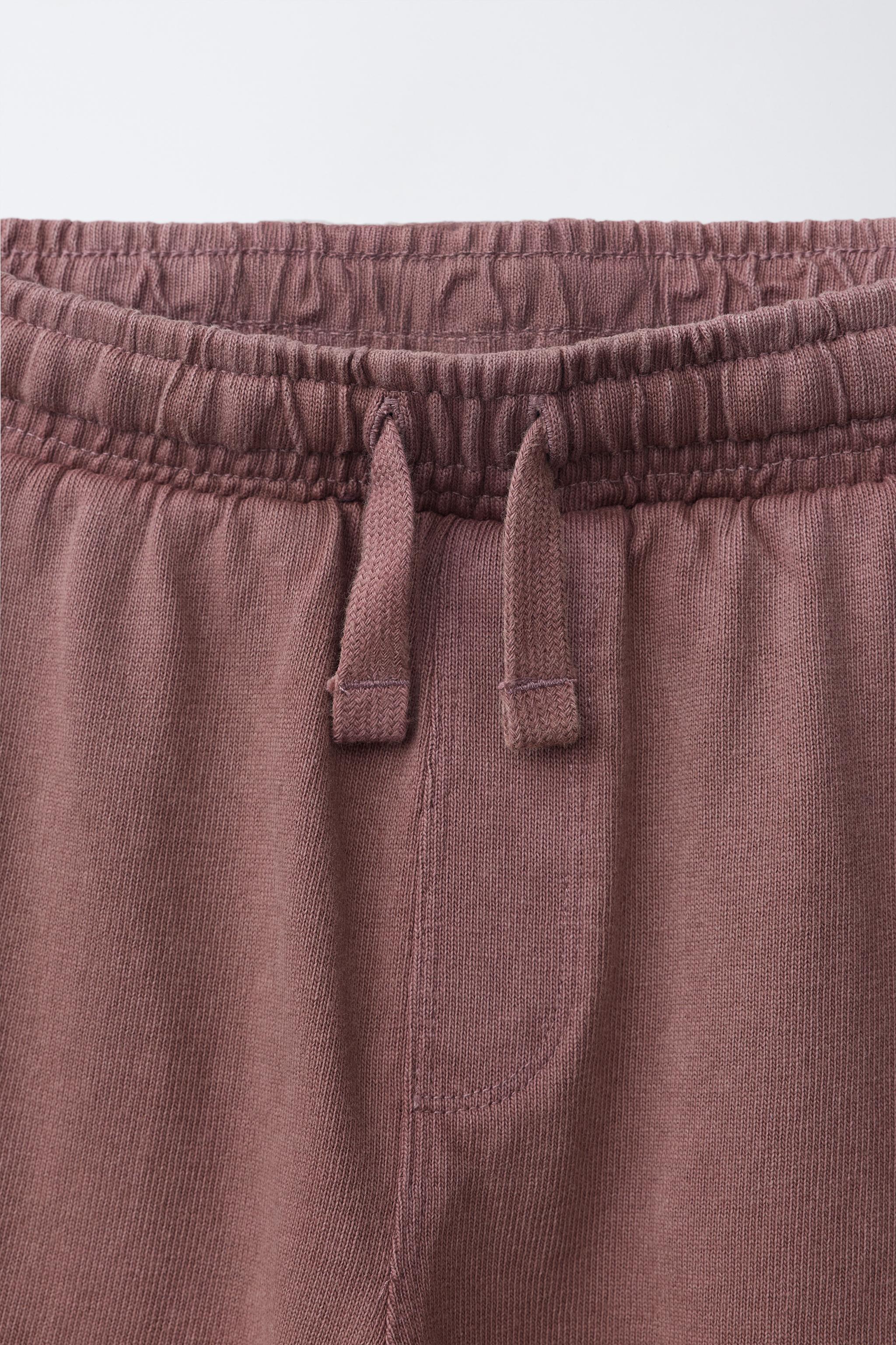 ENSEMBLE T-SHIRT ET BERMUDA UNI TEINT SUR PIÈCE